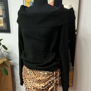 Black off the shouldered wool sweater. Size L.